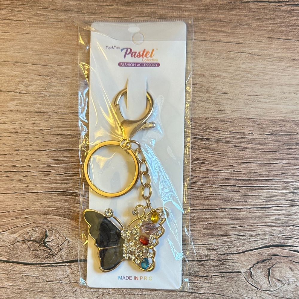 4/$20🙈NIB Pastels Gold and Black Butterfly Keychain
